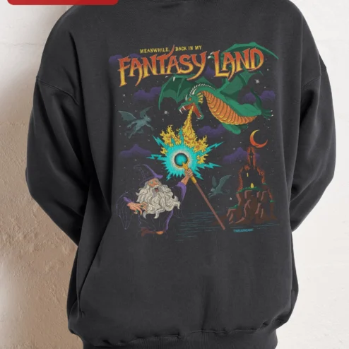 Customer in Chicago, Illinois wearing Meanwhile Back In My Fantasy Land Hoodie Wizard Dragon Graphic Pullover
