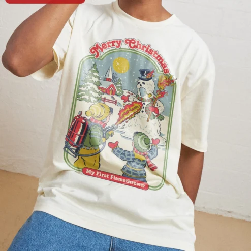 Merry Christmas My First Flamethrower Tee Funny Skeleton Snowman Holiday Graphic Shirt Gift for Him on a hanger, ready to ship from Chicago, Illinois
