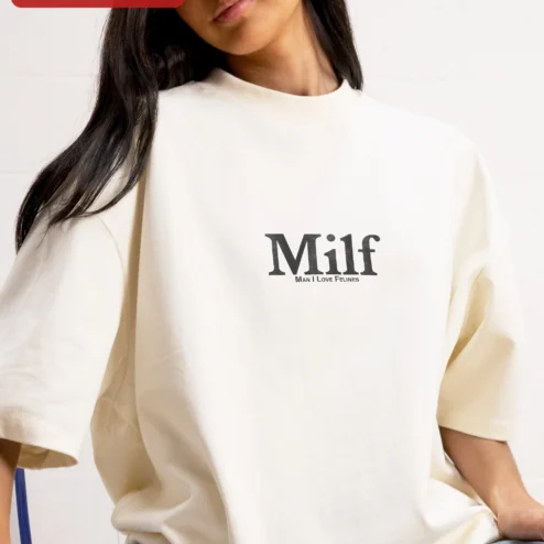Milf Man I Love Felines Tee Cat Lover Funny Graphic Shirt on a hanger, ready to ship from Chicago, Illinois