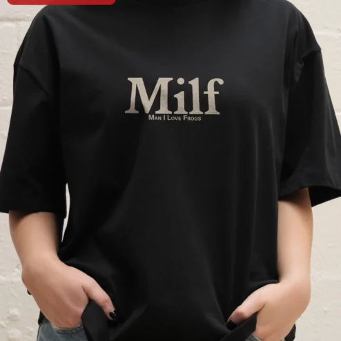 Milf Man I Love Frogs Tee Funny Frog Lover Gift Novelty Graphic T-Shirt for Men on a hanger, ready to ship from Chicago, Illinois