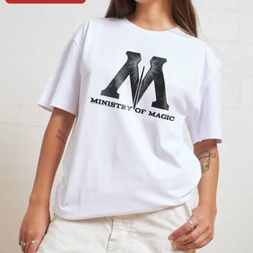 Customer in Chicago, Illinois wearing Ministry of Magic Logo Distressed Graphic Tee Wizarding World Fan Gift T-Shirt