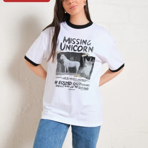 Close-up of Missing Unicorn Shits Gold Vomits Rainbows Funny Sarcastic Graphic Tee for streetwear fans in Chicago, Illinois