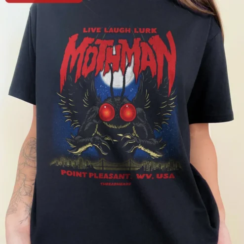 Mothman Live Laugh Lurk Point Pleasant WV Graphic Tee Cryptid Humor Shirt on a hanger, ready to ship from Chicago, Illinois