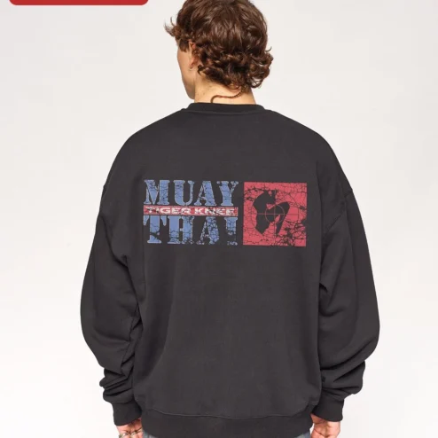 Muay Thai Tiger Knee Sweatshirt Vintage Martial Arts Crewneck for Fighters and Fans on a hanger, ready to ship from Chicago, Illinois