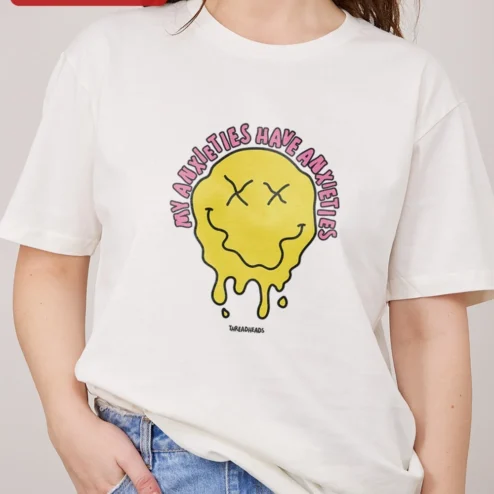 My Anxieties Have Anxieties Tee Melting Smiley Face Mental Health Humor Graphic Shirt for Gen Z on a hanger, ready to ship from Chicago, Illinois