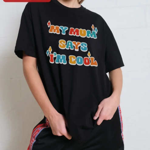 Customer in Chicago, Illinois wearing My Mum Says I'm Cool Graphic Tee Funny British Humor Gift for Women