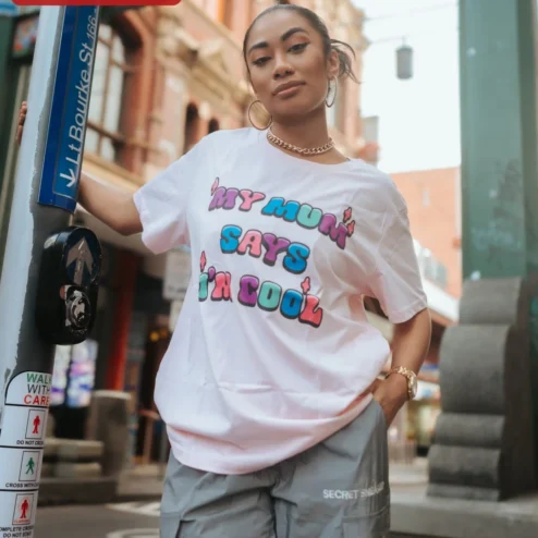 Customer in Chicago, Illinois wearing My Mum Says I'm Cool Graphic Tee Funny British Humor Gift for Women