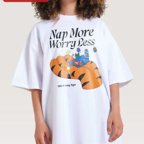 Nap More Worry Less Take It Easy Tiger Tee Funny Sleeping Cat Graphic Shirt for Introverts on a hanger, ready to ship from Chicago, Illinois