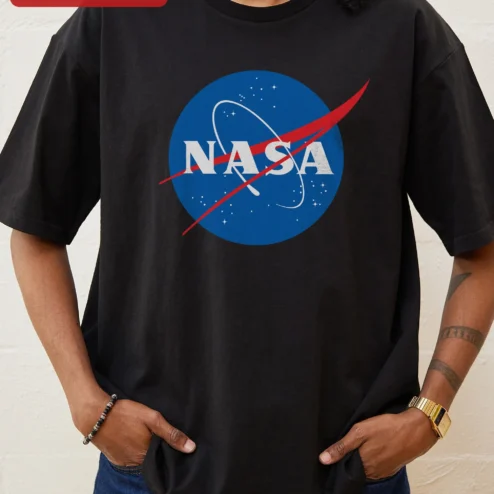 NASA Meatball Logo Tee Classic Space Agency Shirt for Astronomy Fans on a hanger, ready to ship from Chicago, Illinois