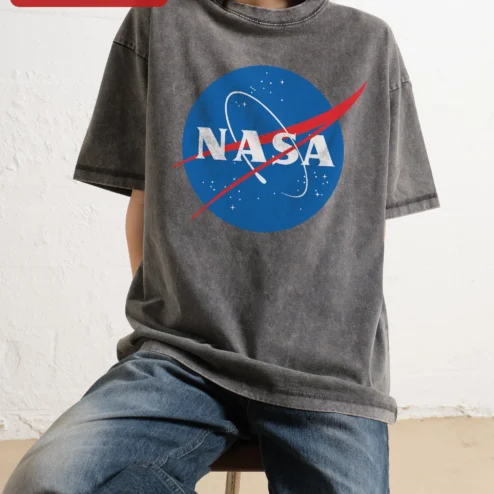NASA Meatball Logo Vintage Acid Wash Graphic Tee for Men Space Enthusiasts on a hanger, ready to ship from Chicago, Illinois