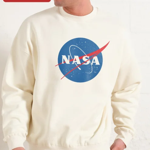 NASA Meatball Logo Vintage Crewneck Sweatshirt for Men and Women Space Enthusiasts on a hanger, ready to ship from Chicago, Illinois