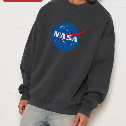 Customer in Chicago, Illinois wearing NASA Meatball Logo Vintage Crewneck Sweatshirt for Men and Women Space Enthusiasts