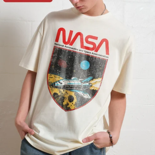 NASA National Aeronautics and Space Administration Vintage Worm Logo Space Shuttle Tee on a hanger, ready to ship from Chicago, Illinois