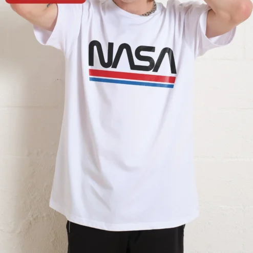 Customer in Chicago, Illinois wearing NASA Worm Logo Vintage Graphic Tee Retro Space Apparel Gift for Men and Women