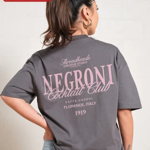 Customer in Chicago, Illinois wearing Negroni Cocktail Club Tee Vintage Bar Sign Graphic Shirt for Bartenders Cocktail Enthusiasts