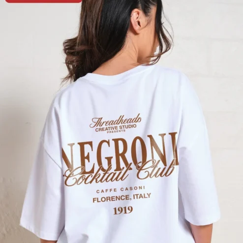 Customer in Chicago, Illinois wearing Negroni Cocktail Club Tee Vintage Bar Sign Graphic Shirt for Bartenders Cocktail Enthusiasts