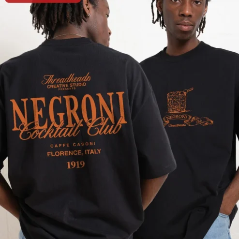 Customer in Chicago, Illinois wearing Negroni Cocktail Club Tee Vintage Bar Sign Graphic Shirt for Bartenders Cocktail Enthusiasts