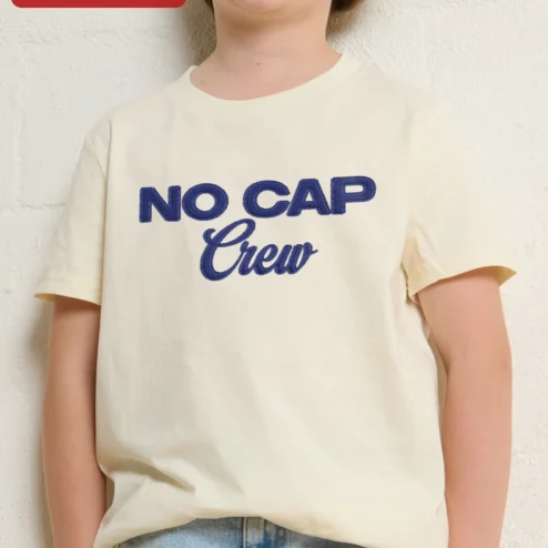 NO CAP Crew Kids Tee Black Embroidered Streetwear Shirt for Girls Gen Alpha Slang Apparel on a hanger, ready to ship from Chicago, Illinois