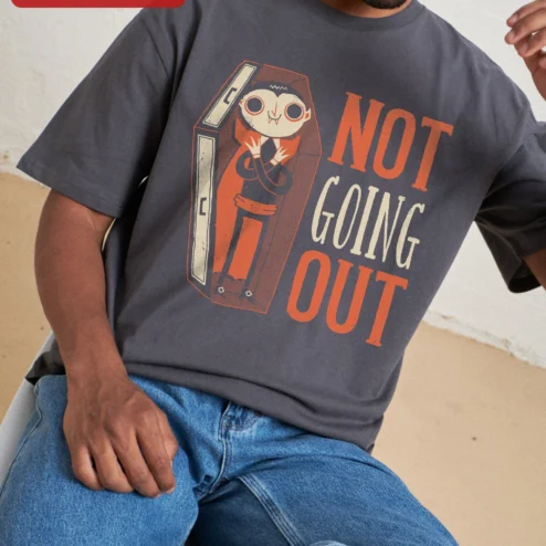 Not Going Out Vampire Coffin Graphic Tee Funny Introvert Halloween Shirt on a hanger, ready to ship from Chicago, Illinois