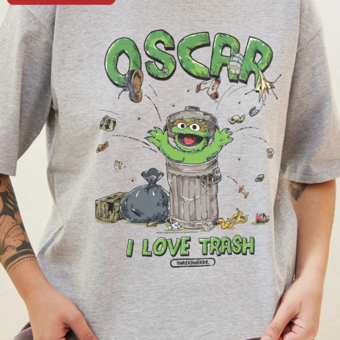 Customer in Chicago, Illinois wearing Oscar I Love Trash Tee Oscar the Grouch Graphic T-Shirt Sesame Street Fan Gift
