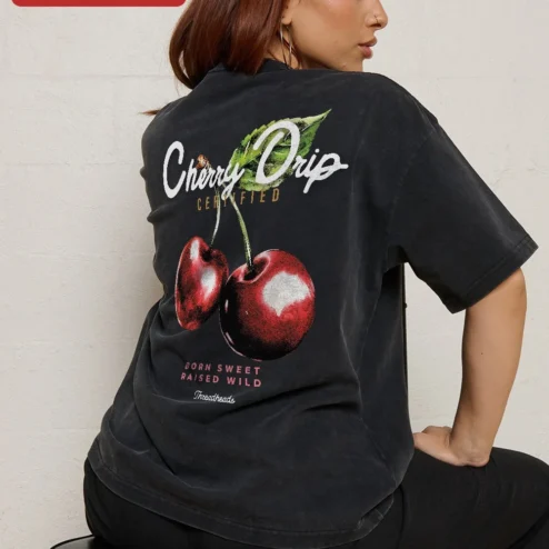 Close-up of Oversized Black Tee Cherry Graphic Embroidered Style Minimalist Streetwear for streetwear fans in Chicago, Illinois