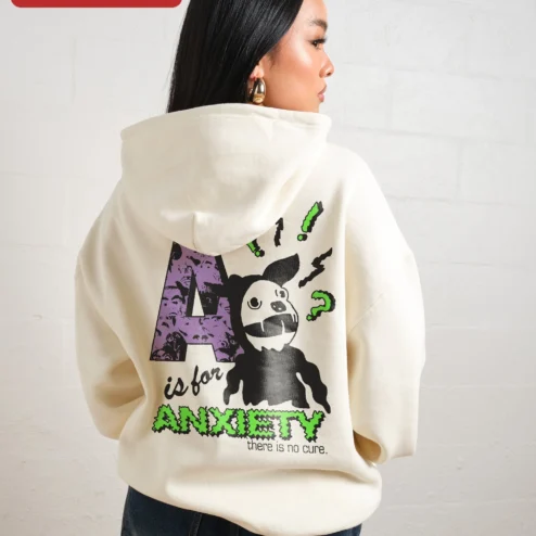 Close-up of Oversized Cream Hoodie Personalized Monogram Vintage Face Collage Left Chest Graphic Women Streetwea for streetwear fans in Chicago, Illinois
