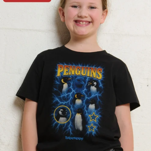 Penguins Graphic Tee for Kids Retro Rock Band Style Penguin Lover Gift on a hanger, ready to ship from Chicago, Illinois