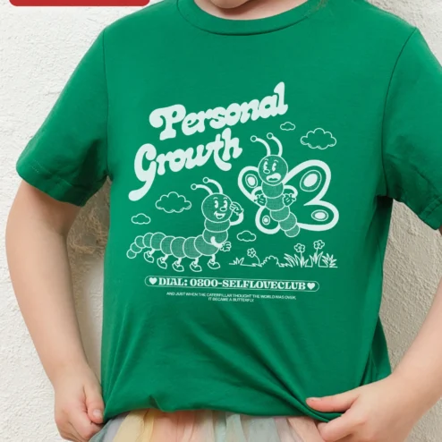 Personal Growth Caterpillar Butterfly Quote Tee Self Love Club Toddler Shirt on a hanger, ready to ship from Chicago, Illinois