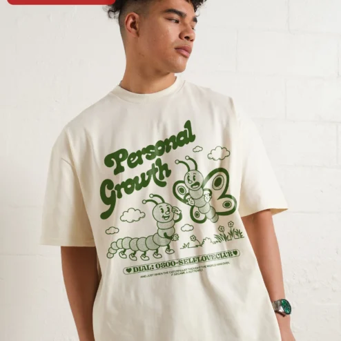 Customer in Chicago, Illinois wearing Personal Growth Caterpillar Butterfly Quote Tee Self Love Club Vintage Cartoon Graphic Shirt