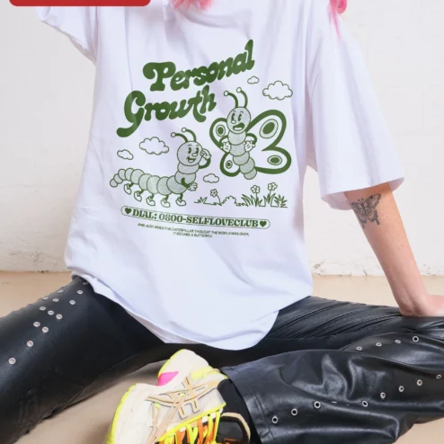 Close-up of Personal Growth Caterpillar Butterfly Quote Tee Self Love Club Vintage Cartoon Graphic Shirt for streetwear fans in Chicago, Illinois