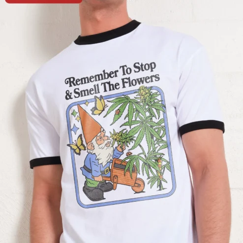 Remember To Stop Smell The Flowers Tee Funny Stoner Garden Gnome Graphic Shirt on a hanger, ready to ship from Chicago, Illinois