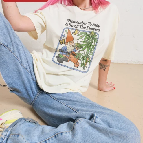 Customer in Chicago, Illinois wearing Remember To Stop Smell The Flowers Tee Funny Stoner Garden Gnome Graphic Shirt