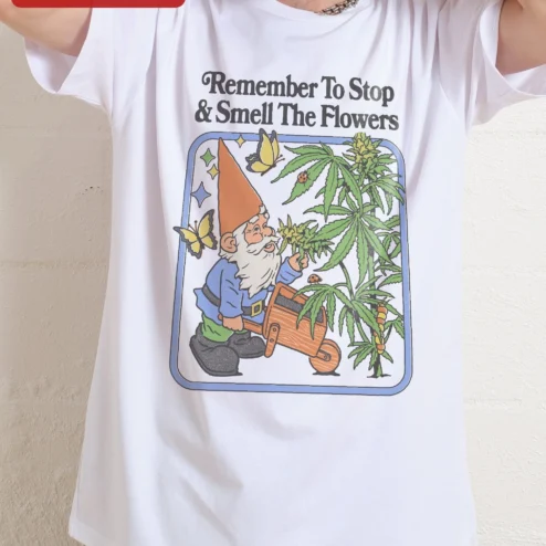 Close-up of Remember To Stop Smell The Flowers Tee Funny Stoner Garden Gnome Graphic Shirt for streetwear fans in Chicago, Illinois