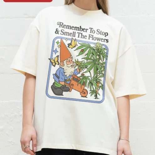 Remember To Stop Smell The Flowers Tee Retro Cartoon Garden Gnome Cannabis Plant Graphic Shirt Stone on a hanger, ready to ship from Chicago, Illinois
