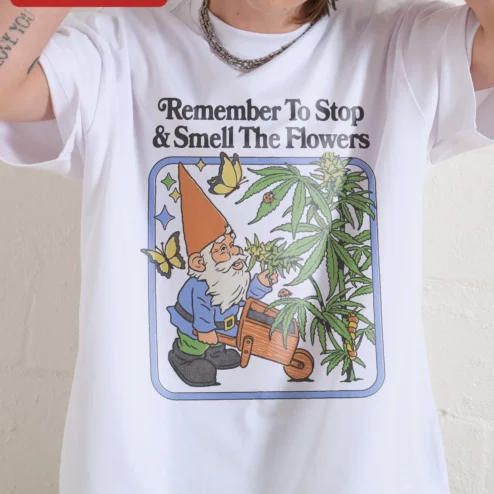 Customer in Chicago, Illinois wearing Remember To Stop Smell The Flowers Tee Retro Cartoon Garden Gnome Cannabis Plant Graphic Shirt Stone