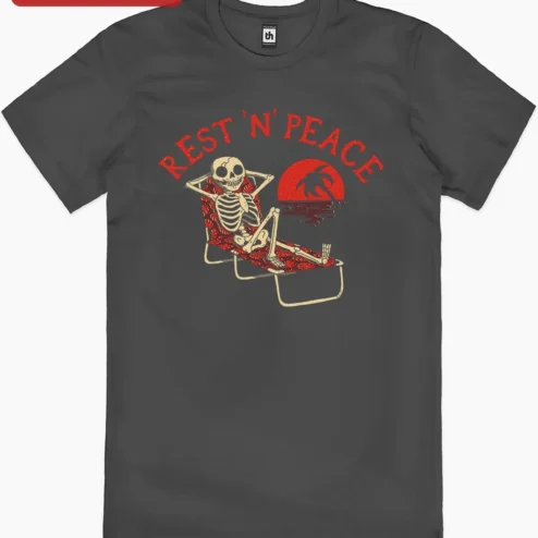 Rest N Peace Tee Funny Skeleton Vintage Sunset Graphic T-Shirt Halloween Spooky Humor Gift on a hanger, ready to ship from Chicago, Illinois