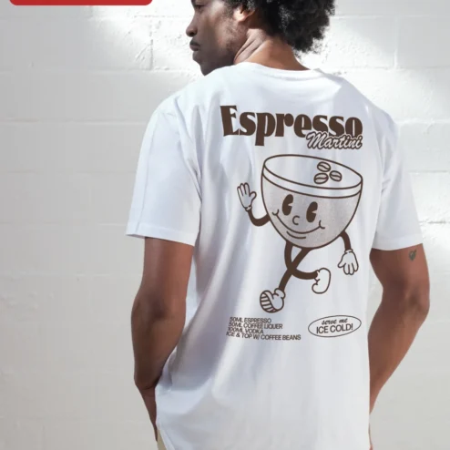 Retro Coffee Cup Mascot Tee Vintage Cartoon Graphic Shirt for Coffee Lovers and Baristas on a hanger, ready to ship from Chicago, Illinois