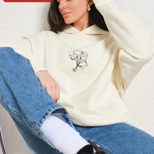Customer in Chicago, Illinois wearing Retro Mascot Coffee Cup Hoodie Vintage Cartoon Character Sweatshirt for Coffee Lovers Gift
