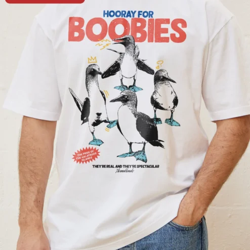 Rizz Em With The Tism Meme Tee Screaming Raccoon Graphic Shirt on a hanger, ready to ship from Chicago, Illinois