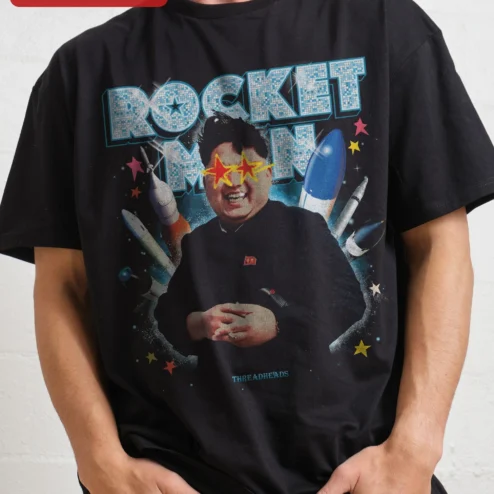 Rocket Man Kim Jong-un Graphic Tee Political Satire Shirt on a hanger, ready to ship from Chicago, Illinois