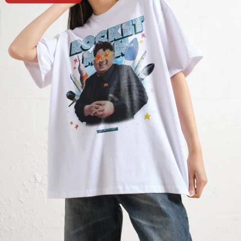 Rocket Man Kim Jong Un Graphic Tee Retro Space Satire Shirt on a hanger, ready to ship from Chicago, Illinois