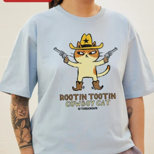 Customer in Chicago, Illinois wearing Rootin Tootin Cowboy Cat Tee Funny Western Graphic Shirt for Cat Lovers