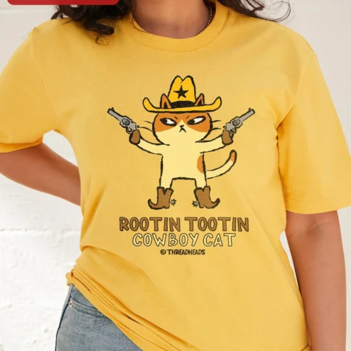 Customer in Chicago, Illinois wearing Rootin Tootin Cowboy Cat Tee Funny Western Graphic Shirt for Cat Lovers