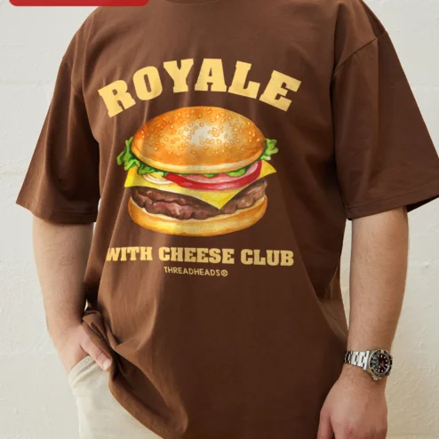 Customer in Chicago, Illinois wearing Royalty With Cheese Club Tee Retro Burger Graphic Shirt Novelty Gift for Foodies
