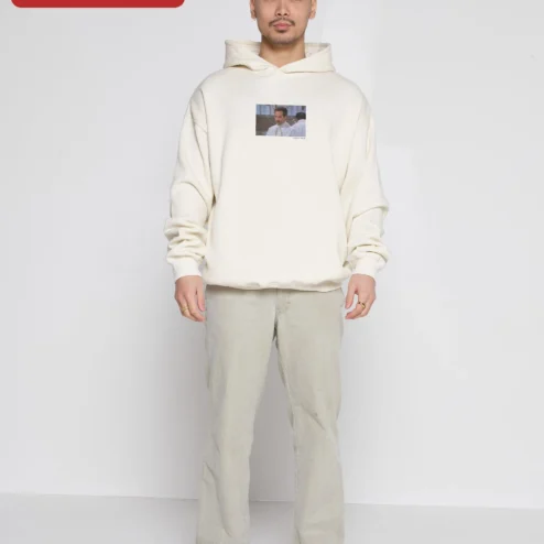 Close-up of Sacha Baron Cohen Hoodie Borat Ali G Comedy Fan Merch Black Pullover for streetwear fans in Chicago, Illinois