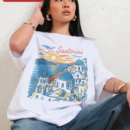 Close-up of Santorini Sunset Retro Travel Poster Tee Greek Island Vacation Souvenir Shirt for streetwear fans in Chicago, Illinois