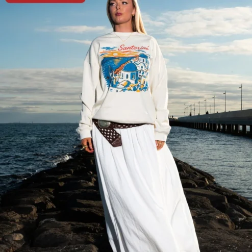 Customer in Chicago, Illinois wearing Santorini Vintage Sunset Crewneck Sweatshirt Greece Travel Gift