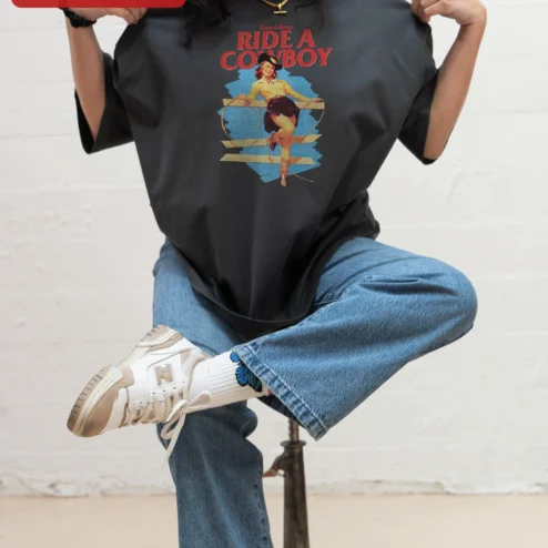 Customer in Chicago, Illinois wearing Save a Horse Ride a Cowboy Graphic Tee Retro Western Pin Up Cowgirl Shirt Funny Country Gift for Wom