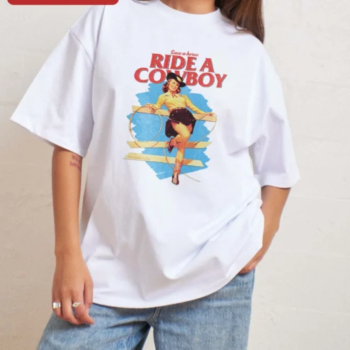 Customer in Chicago, Illinois wearing Save a Horse Ride a Cowboy Graphic Tee Retro Western Pin Up Cowgirl Shirt Funny Country Gift for Wom