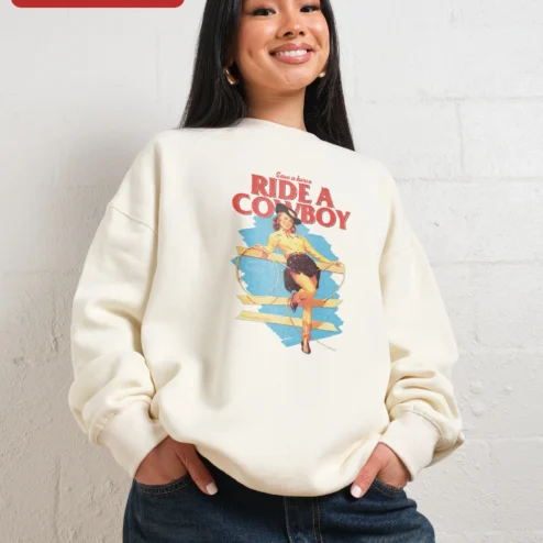Customer in Chicago, Illinois wearing Save a Horse Ride a Cowboy Sweatshirt Western Pin Up Cowgirl Graphic Crewneck for Women